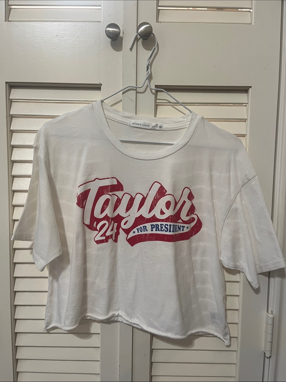 Altar'd State White Graphic Tee with Small Floral Tag Detail
